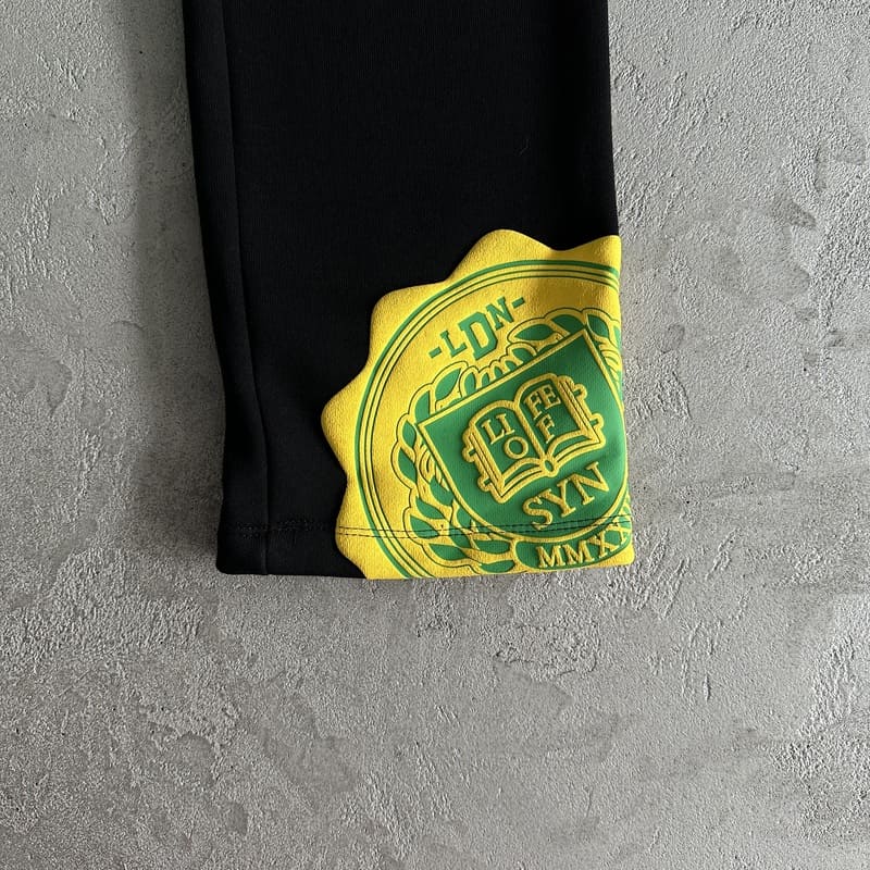 Conjunto Syna World College Logo Preto/Amarelo